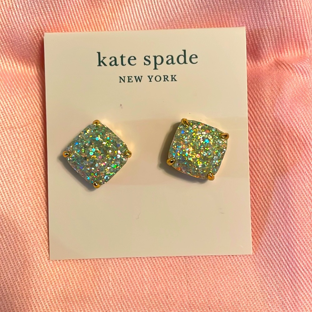 KATE SPADE opal and glitter earrings.